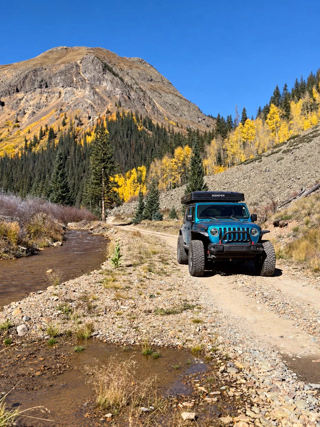 Summit, a privately owned Jeep Wrangler Rubicon with iKamper rooftop tent professionally managed by Peak Overland in Colorado